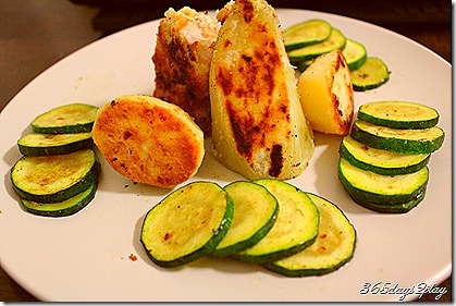 Crumbed pork with spuds and zucchini