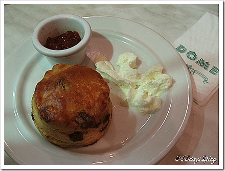 Raisin and Date Scone with Strawberry Jam and Whipped Cream