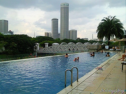 Fullerton Hotel Swimming Pool with the Swisshotel in the background
