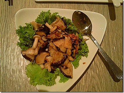 Sauteed mushrooms in lettuce bed