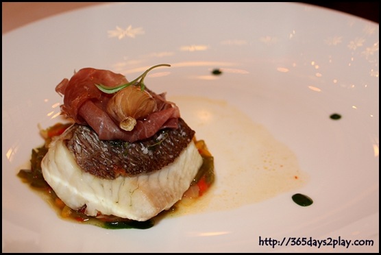 Brasserie Les Saveurs - oven-baked red snapper, confit of capsicum, parma ham and herbs coulis