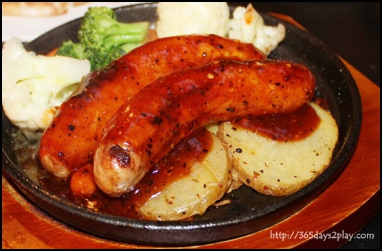 Beer Market - Grilled Pork Cheese Bratwurst served with sliced potatoes, onions and seasonal vegetables $13 (2)