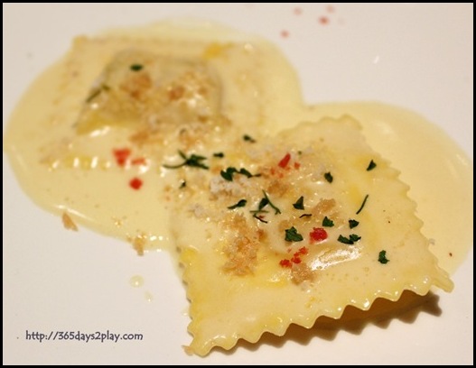 Covelli Italian Bistro - Ravioli filled with Black Truffle & Cheese in Brown Butter Cream Sauce topped with grated Hazelnuts (2)