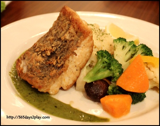 Hard Rock Cafe - Crispy Sea Bass served with Pesto Sauce, smashed potatoes and vegetables $26  