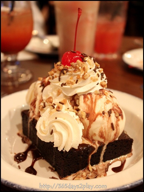 Hard Rock Cafe - Haagen-Dazs vanilla ice cream and hot fudge on a fresh brownie, topped with chopped walnuts, chocolate sprinkles, fresh whipped cream and a cherry (2)