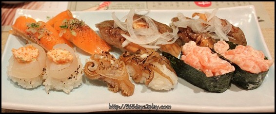 Itacho - Middle sushi is Roasted Squid Leg Sushi $1.20 U.P $2.40