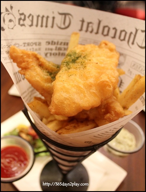 Au Chocolat - Battered Fish & Spiced Chips $22 - Lightly Battered white fish fillets with crispy chips, tossed with parmesan & herbs, served with signature green tartar sauce