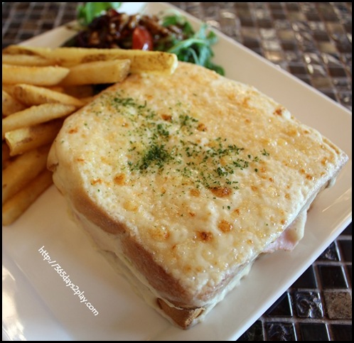 Au chocolat - Croque Monsieur $16 - Sliced ham & aged gruyere cheese between 2 slices of crusty bread, coated with creamy bechamel grilled