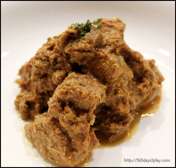 Cafe Melba - Melba beef rendang in (Beef in coconut milk, ginger and spices, shoe-string fries and pizza breads) $18 (1)