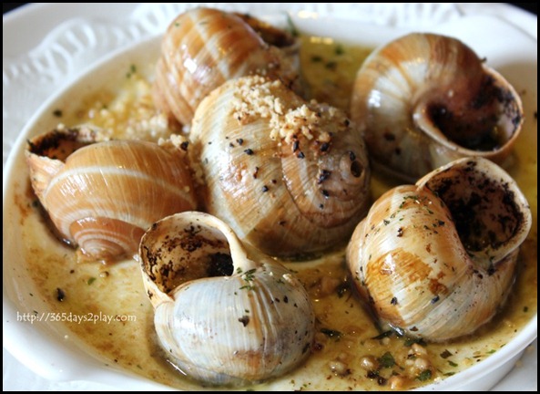 STREET 50 - Hazelnut Escargot (Slow-baked Burgundy snails stuffed with hazelnut butter and flambed with brandy) $14 (3)