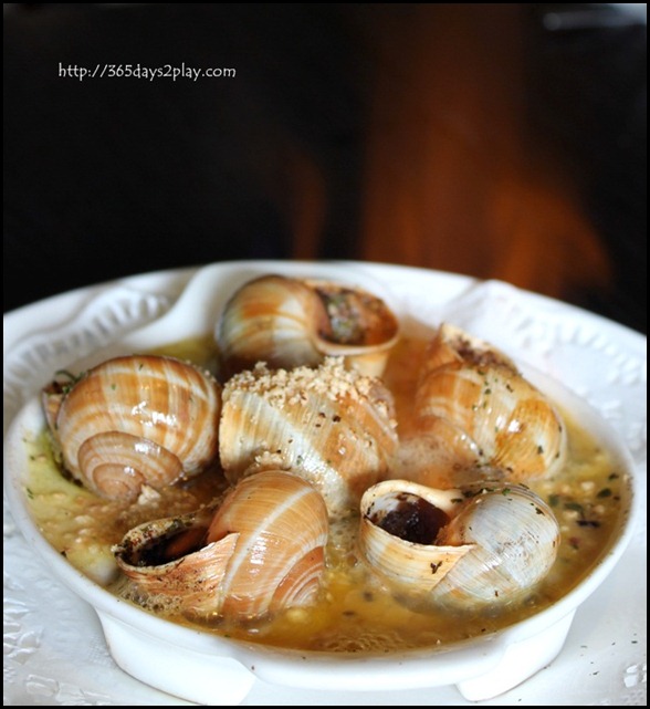 STREET 50 - Hazelnut Escargot (Slow-baked Burgundy snails stuffed with hazelnut butter and flambed with brandy) $14 (2)
