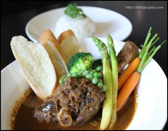 STREET 50 - Lamb Rendang (Slow-braised whole lamb shank with rendang paste in claypot with carrots, potatoes, peas) $24 (2)