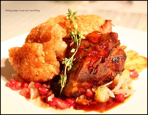 Sous Vide Pork - pork Shoulder braised in root beer and spice, savoury crackling skin, pineapple and pomegranate salsa, toragashi pepper, plum salt ($36  )