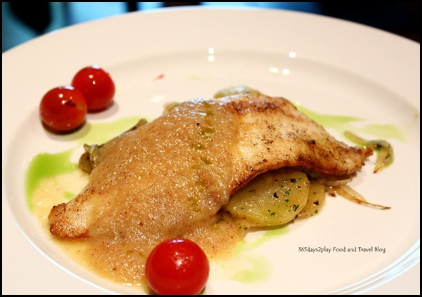 Pan seared Pacific Snapper Loin served on a bed of Lyonnais Potato and Kiwi Coulis