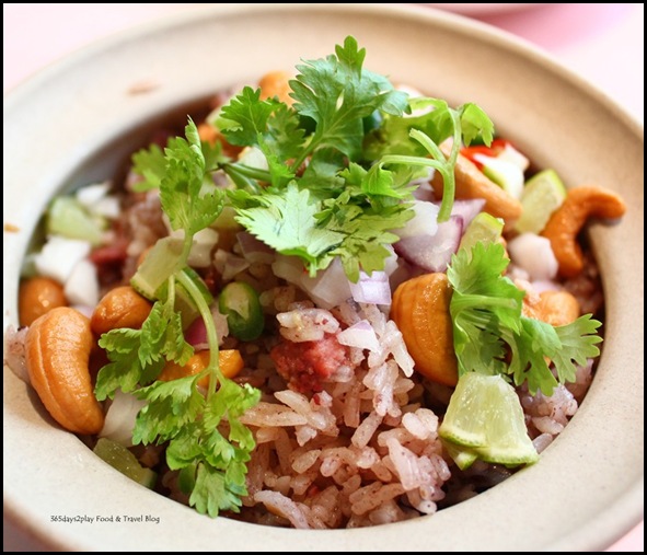 Thanying - Khao Ohb Nam-Liaeb (Black Olive rice with Minced Chicken in Claypot) $17