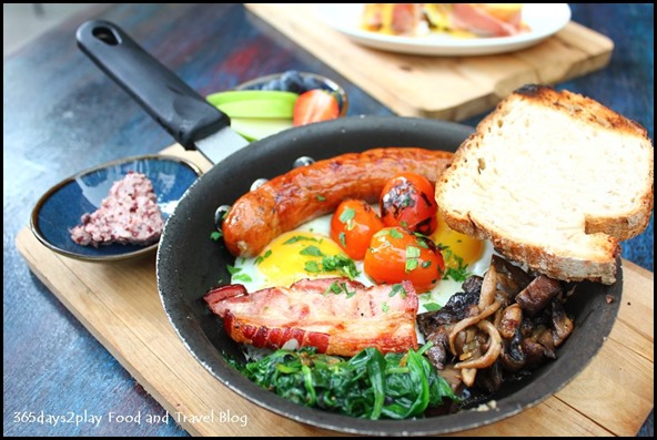 Intrepid Gastro Bar - Breakfast Pan – Two eggs, pork sausage, thick cut smoked bacon, spinach, tomato and grilled mushrooms served in hot pan and side toast ($19 ) (1)