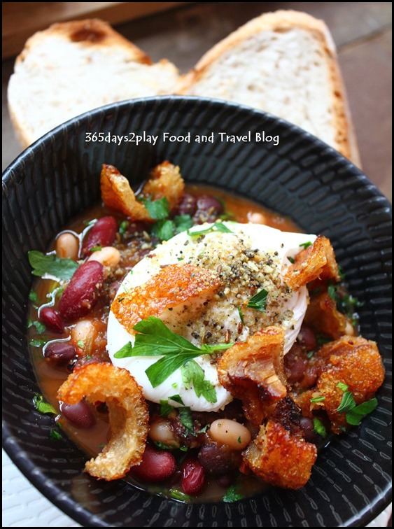 Intrepid Gastro Bar - Dukkah Spiced Baked Beans — Tomato & herbs ragu, poached egg, and roast pork belly ($16 ) (1)