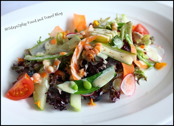 Au Jardin - Mesclun salad with shaved vegetables, marinated lentils, seasonal fruits and honey mustard dressing