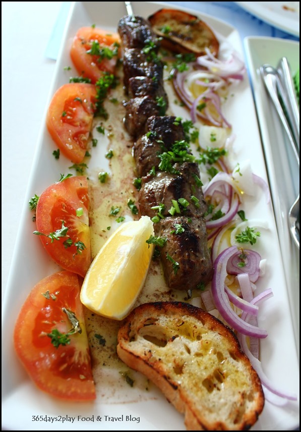 Blu Kouzina -Kalamaki Souvlaki - Beef skewers served with fresh onion, sliced tomato, in-house bread and lemon $12 (7)
