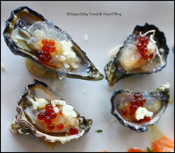 Ku De Ta - Oysters on ice with ikura, konbu jelly, apple