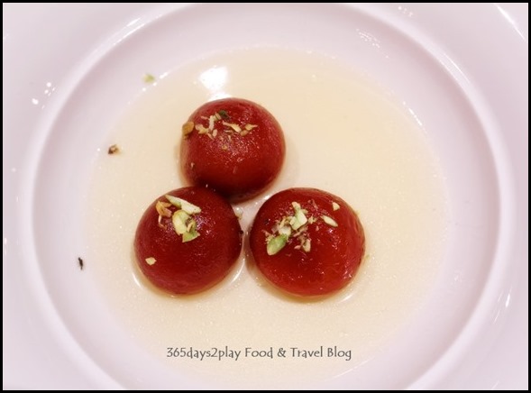 Gulab Jamun - Reduced milk balls; soaked in rose flavoured syrup