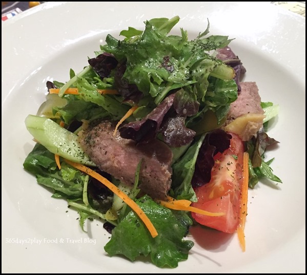 Paul Singapore -  Grilled beef with gherkins, carrots, tomato vine, cherry tomatoes, red onions, cucumbers and mixed salad