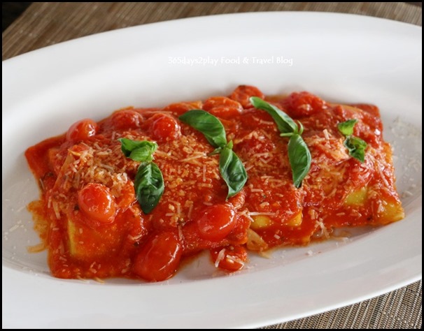 Pepenero - Homemade ravioli filled with ricotta cheese served in tomato sauce and basil $24