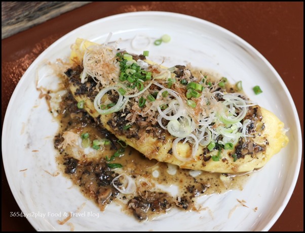 Salt Tapas Bar - Cigar omelette with mushroom cepe sauce and green onions- $15  