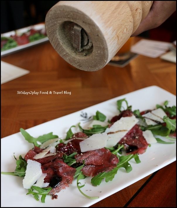 Kaiserhaus - Venison Carpaccio (Thinly sliced venison loin with rocket and parmesan shavings) $25