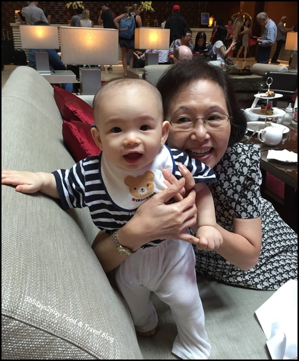 Baby climbing on sofa