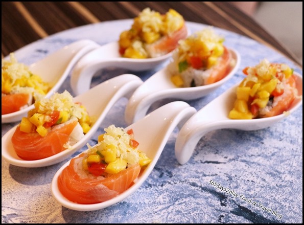 Izy Dining & Bar - Mango Salsa Roll (Tempura shrimp, raw salmon & avocado topped with mango salsa sauce) $18