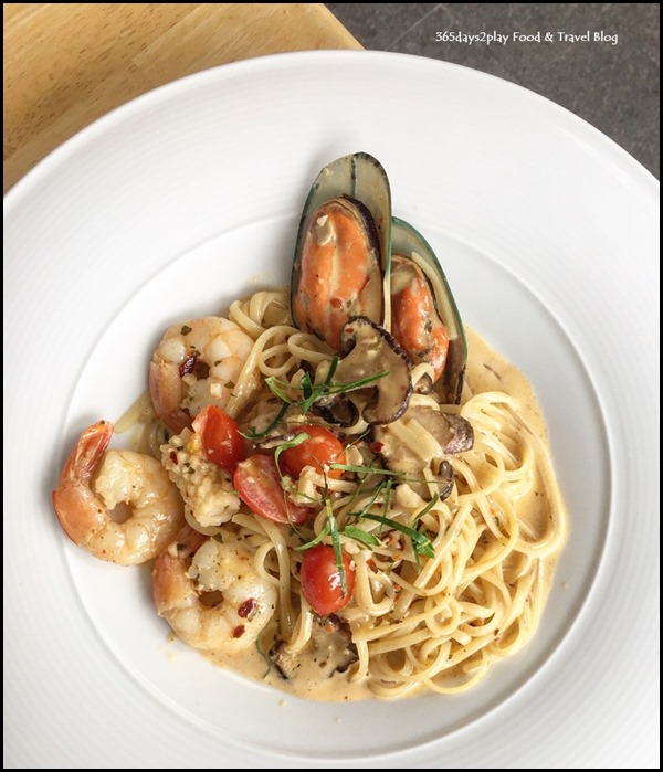 Meats & Malts - Seafood Tom Yam Pasta (Mixed seafood with Thai Tom Yam spices) $15.80