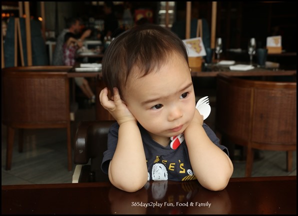 Bored Toddler waiting for food (1)