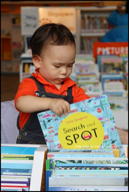 Toddler browsing for books