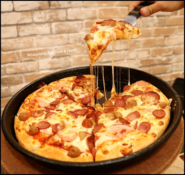 Pizza Hut - Meat Galore Pizza Cheese Pull