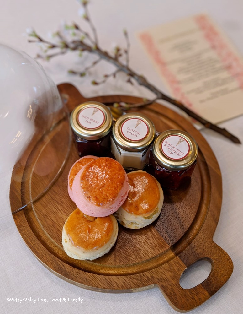 Conrad Sakura Afternoon Tea - Warm scones served with clotted cream, wild berry jam and dragon fruit raspberry jam