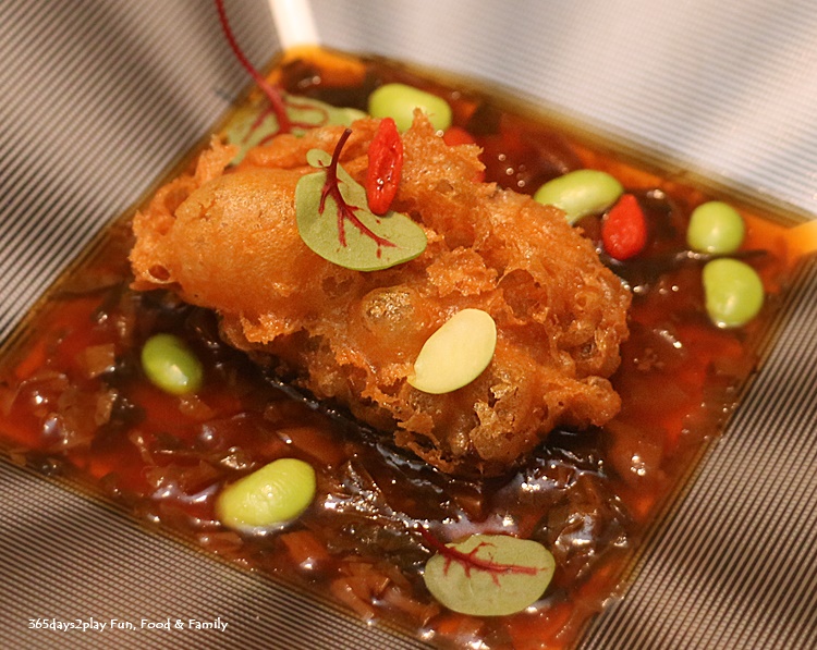 Hai Tien Lo - Deep-fried crispy sea cucumber stuffed with minced pork and shrimps, accompanied with preserved vegetables